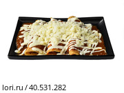 Chilaquiles with chicken and sour cream and sauce with many vegetables on white background. Стоковое фото, фотограф Татьяна Терехина / Фотобанк Лори