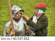 Knights in military uniforms at the Festival of the historical reconstruction of the Middle Ages "Vyborg Castle" (2014 год). Редакционное фото, фотограф Анна Кривицкая / Фотобанк Лори