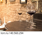 Vintage wine poured into glasses and decanter. Стоковое фото, фотограф Саблин Станислав / Фотобанк Лори