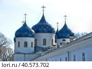 Dome St. George's monastery in Veliky Novgorod, orthodox Christian Church. The Orthodox religion of Russia. Monastery's oldest Church buildings in Russia in 1030 year. White Church with blue domes. (2012 год). Редакционное фото, фотограф Анна Кривицкая / Фотобанк Лори