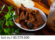 Chopped pickled mushrooms (Lactarius deliciosus) on board. Стоковое фото, фотограф Яков Филимонов / Фотобанк Лори