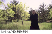 master tai Chi practices kung fu with a stick in nature. Стоковое видео, видеограф Денис Кебедов / Фотобанк Лори