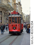 Nostalgic Red Tram of Istanbul. Historic tram in Taksim Istiklal Street. Touristic popular destination Taksim Istiklal Street. (2018 год). Редакционное фото, фотограф Анна Кривицкая / Фотобанк Лори