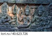 Apsara carved on the wall of the Elephant terrace, Angkor Thom. cambodia. (2017 год). Редакционное фото, фотограф Анна Кривицкая / Фотобанк Лори