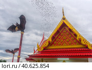 Wat Khao Chong Pran Temple for people pray to buddha and look Hundred Million Bats from Khao Chong Pran Cave (2018 год). Редакционное фото, фотограф Анна Кривицкая / Фотобанк Лори