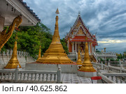 Wat Khao Chong Pran Temple for people pray to buddha and look Hundred Million Bats from Khao Chong Pran Cave (2018 год). Редакционное фото, фотограф Анна Кривицкая / Фотобанк Лори
