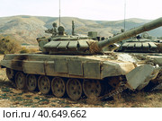 Russian battle tanks at tankodrome in mountains. Стоковое фото, фотограф Сергей Толмачёв / Фотобанк Лори