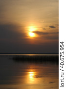Beautiful sunset over the lake. Стоковое фото, фотограф Анна Кривицкая / Фотобанк Лори