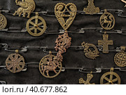 Jewelry with Slavic and Scandinavian symbols on sale. Стоковое фото, фотограф Анна Кривицкая / Фотобанк Лори