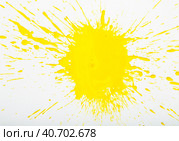 Image of yellow paint spots spilled on background of white paper. Стоковое фото, фотограф Яков Филимонов / Фотобанк Лори
