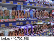 Russia, St. Petersburg 08,03,2014 Hair colors on the shelf in the supermarket. Редакционное фото, фотограф Анна Кривицкая / Фотобанк Лори