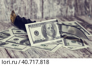 Concept : abandoning the us currency in the world market. Стоковое фото, фотограф Сергей Сергеев / Фотобанк Лори