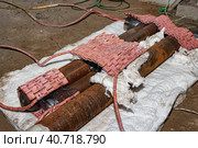 Подготовка заготовок деталей трубопроводов к термообработке. Стоковое фото, фотограф Сергей Сергеев / Фотобанк Лори