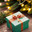 Green gift box with a gold ribbon on a wooden table next to a christmas tree with lights on it. Generative AI. Стоковое AI-изображение, AI-художник Mixail59 / Фотобанк Лори