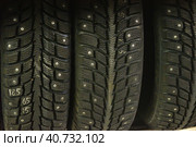 Winter studded tires in the shop. Стоковое фото, фотограф Анна Кривицкая / Фотобанк Лори