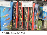 Finland, Imatra 12,05,2015 Spoons and floats for fishing on sale in a supermarket. Редакционное фото, фотограф Анна Кривицкая / Фотобанк Лори