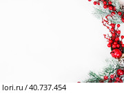 Spruce branch tree branches with Christmas decor. Christmas, New Year's concept. Top view, close-up. Copy space. Стоковое фото, фотограф Tatiana Syrtseva / Фотобанк Лори