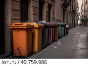 Multi-colored garbage containers on the city street, recycling and separate waste collection concept, AI Generated. Стоковое AI-изображение, AI-художник Станислав Тарко / Фотобанк Лори