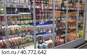 Yogurts on a shelf in a supermarket during the coronavirus epidemic (2020 год). Редакционное фото, фотограф Анна Кривицкая / Фотобанк Лори
