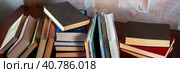 Books stand and lie in piles on the table. Top and side view. Close-up. Panorama. Background for libraries, education, science. Стоковое фото, фотограф Бузмакова Светлана / Фотобанк Лори