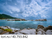 Tropical island landscape of beautiful beach with impressive clouds, Anse Marron, La Digue, Seychelles (2019 год). Стоковое фото, фотограф Igor Tichonow / Фотобанк Лори
