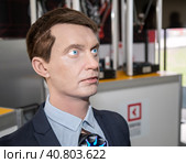 Робот-андроид - сервисный робот для бизнеса Robo-С компании "Промобот" на одном из стендов в КВЦ "Патриот" очень похож на обычного человека. Международный военно-технический форум «Армия-2021» Редакционное фото, фотограф Наталья Николаева / Фотобанк Лори