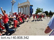 Football fans of the national team of Tunisia with national flags and attributes in fanzone fanfesta before the match England-Tunisia (2016 год). Редакционное фото, фотограф Сергей Сергеев / Фотобанк Лори