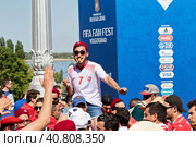 Football fans of the national team of Tunisia with national flags and attributes in fanzone fanfesta before the match England-Tunisia (2016 год). Редакционное фото, фотограф Сергей Сергеев / Фотобанк Лори