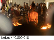 A woman performing a fire show at the street. Стоковое фото, фотограф Константин Шишкин / Фотобанк Лори