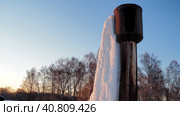 Water supply. A frozen waterfall from a water tower in a locality. Siberia. Hand held. Стоковое видео, видеограф Сергей Медведев / Фотобанк Лори