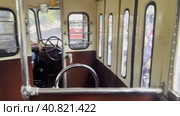 The car driver controls the retro tram car in motion. View from the tram cabin. (2023 год). Редакционное видео, видеограф Ярославский Максим / Фотобанк Лори