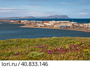 Village Uelen. It is the easternmost settlement in Russia and the whole of Eurasia. Located on a long spit between the lagoon and the Chukchi Sea. Summer in the Arctic. Chukotka, Russian Far East. Стоковое фото, фотограф Андрей Степанов / Фотобанк Лори