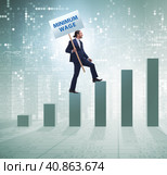 Concept of minimum wage with businessman. Стоковое фото, фотограф Elnur / Фотобанк Лори