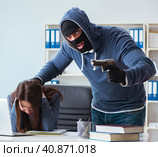 Criminal recording message for ransom with victim businesswoman. Стоковое фото, фотограф Elnur / Фотобанк Лори
