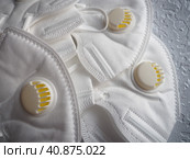 KN95 masks. Respirator, practical personal protective equipment. Several layers of the mask perfectly clean the inhaled air and effectively protect the respiratory tract from infection. Стоковое фото, фотограф Юлия Петровская / Фотобанк Лори