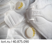 KN95 masks. Respirator, practical personal protective equipment. Several layers of the mask perfectly clean the inhaled air and effectively protect the respiratory tract from infection. Стоковое фото, фотограф Юлия Петровская / Фотобанк Лори