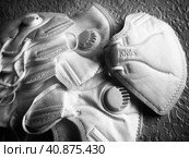 KN95 masks. Respirator, practical personal protective equipment. Several layers of the mask perfectly clean the inhaled air and effectively protect the respiratory tract from infection. Стоковое фото, фотограф Юлия Петровская / Фотобанк Лори