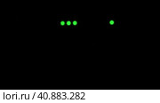 Wi-Fi router or modem light blinking. Wireless internet connection. Flashing green warning lights in black darkness. The process of transferring information through modern means of communication. Стоковое видео, видеограф Юлия Петровская / Фотобанк Лори
