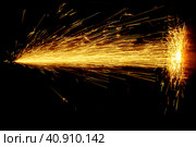 Glowing Flow of Sparks in the Dark. Стоковое фото, фотограф Стас Пересыпкин / Фотобанк Лори