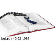 Bible on a white background. Sacred book and wooden rosary. Стоковое фото, фотограф Сергей Толмачёв / Фотобанк Лори