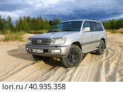 Toyota Land Cruiser 100 (2022 год). Редакционное фото, фотограф Art Konovalov / Фотобанк Лори
