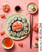 Smooth laying out of various sushi rolls on plates with chopsticks on the table. Created by AI. Стоковое AI-изображение, AI-художник Ярославский Максим / Фотобанк Лори