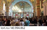 Lacarak, Serbia, 08.05.23 Divine service in the temple dedicated to the worship of God. Christian Orthodox Service. Singing prayers, reading the Holy Scriptures, performing the sacraments and rituals. Редакционное видео, видеограф Юлия Петровская / Фотобанк Лори