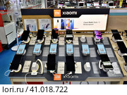Moscow, Russia - Aug 14. 2023. Xiaomi Redmi note 11 phone in Mvideo shop of electronics and home appliances in Zelenograd. Редакционное фото, фотограф Володина Ольга / Фотобанк Лори