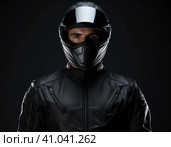 Biker in a modern helmet. Стоковое AI-изображение, AI-художник Кирилл Черезов / Фотобанк Лори