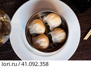 Japanese tasty dumplings siumai in steamers. Стоковое фото, фотограф Яков Филимонов / Фотобанк Лори