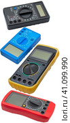 Цифровые мультиметры разного типа на белом фоне. Digital  multimeters on a white. Стоковое фото, фотограф Татьяна Д / Фотобанк Лори
