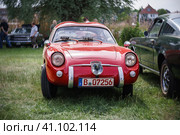 WERDER (HAVEL), GERMANY - MAY 20, 2023: The sport car Fiat-Abarth 750 Zagato "Double Bubble". Swirl bokeh, art lens. Oldtimer - Festival Werder Classics 2023. Редакционное фото, фотограф Sergey Kohl / Фотобанк Лори