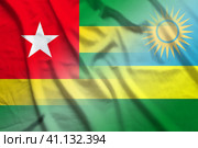 Togo and Rwanda official flag transborder relations RWA TGO. Стоковая иллюстрация, иллюстратор Кабак Дмитрий / Фотобанк Лори
