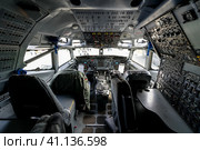 BERLIN, GERMANY - APRIL 25, 2018: Cockpit of Boeing E-3A Sentry AWACS. Exhibition ILA Berlin Air Show 2018. Редакционное фото, фотограф Sergey Kohl / Фотобанк Лори